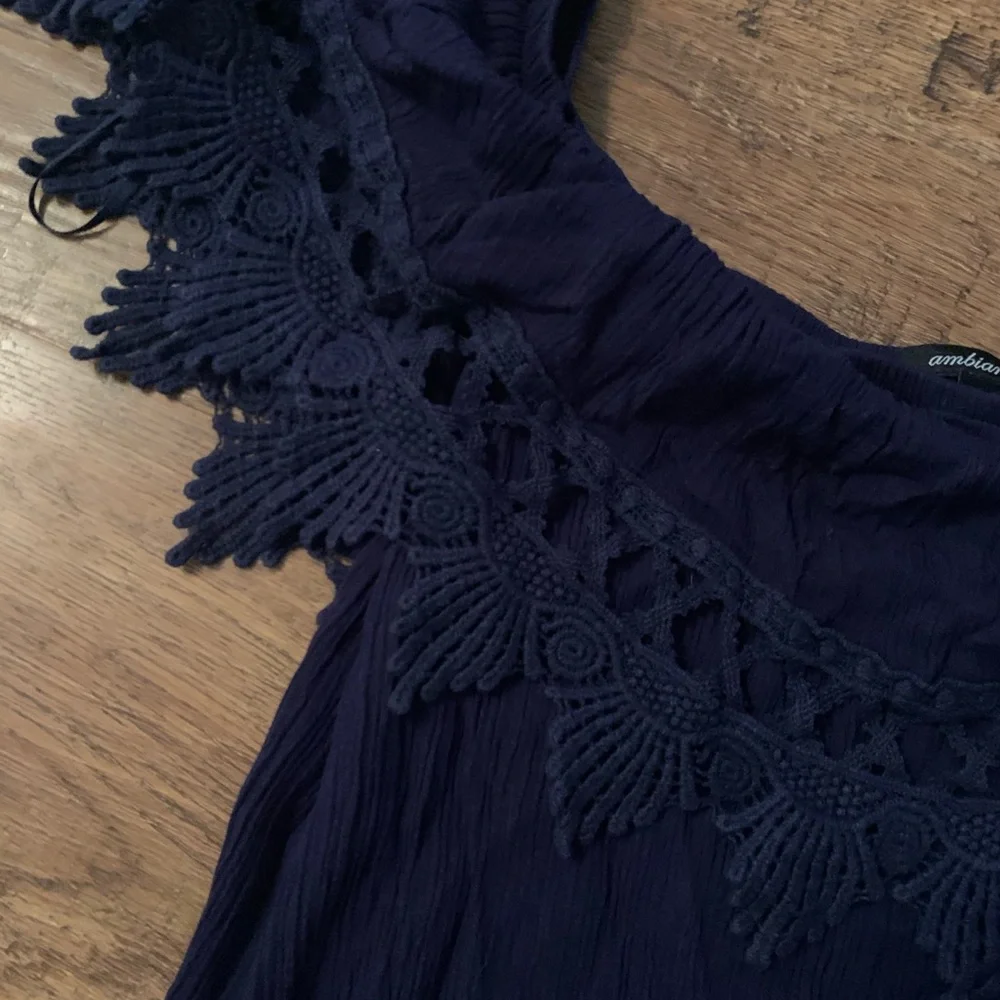 Ruffled romper L